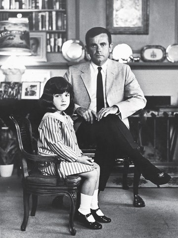 Young Dominique with her father