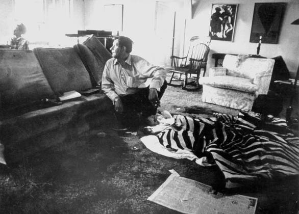 Clairvoyant Peter Hurkos in the living room where Sharon Tate and Sebring died.