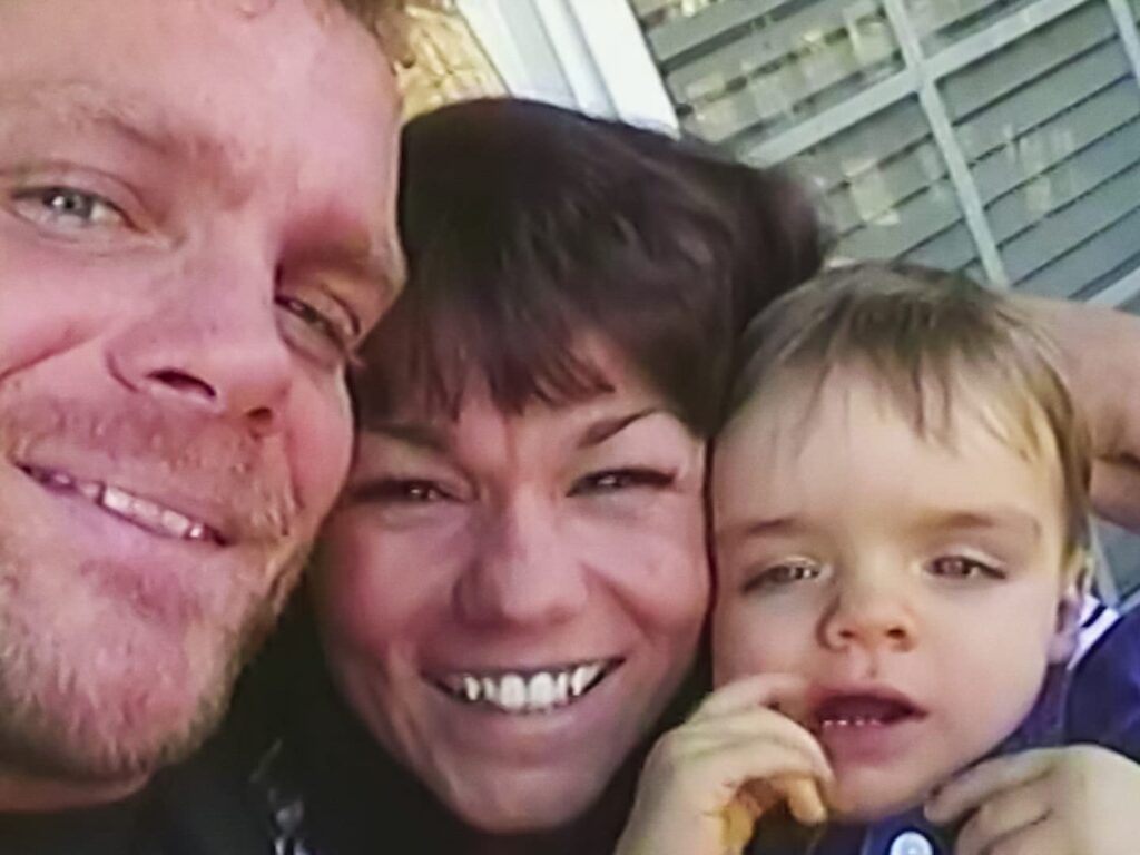 Chris Benoit with his wife and son